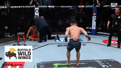 Buffalo Wild Wings Logo On Boxing Ring GIF