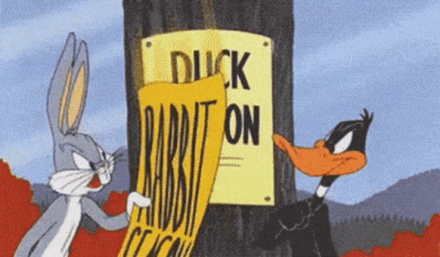 Bugs Bunny And Daffy Duck Arguing For The Season GIF