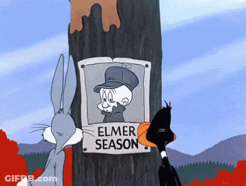 Bugs Bunny And Looney Tunes Are Looking At A Picture Of Elmer Season GIF