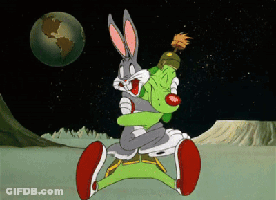 Bugs Bunny And Marvin The Martian Are Hugging In A Cartoon GIF