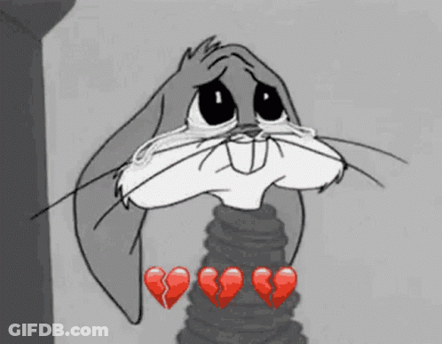 Bugs Bunny From Looney Tunes Is Crying With Broken Hearts Around His Neck . GIF