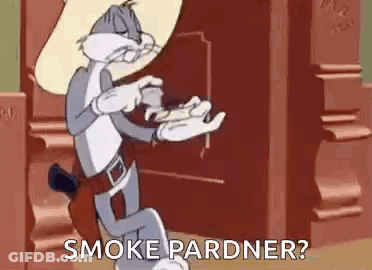 Bugs Bunny From Looney Tunes Is Smoking A Cigarette While Wearing A Cowboy Hat And Holding A Gun . GIF