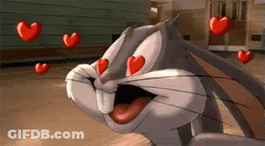 Bugs Bunny From Looney Tunes Is Surrounded By Red Hearts . GIF