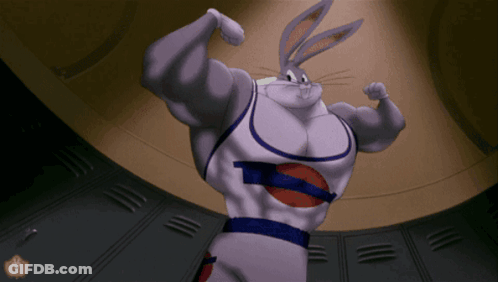 Bugs Bunny From Space Jam Is Flexing His Muscles In A Locker Room GIF