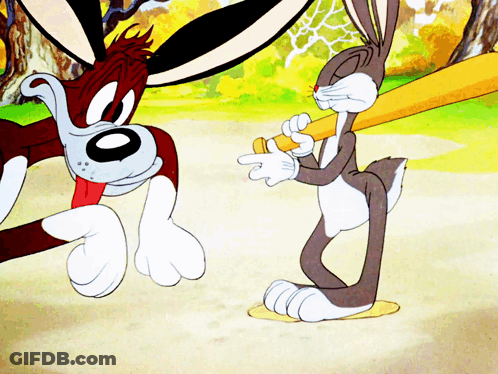 Bugs Bunny Holding Bat Pointing At Dog GIF