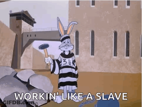 Bugs Bunny Holding Hammer In Jail Cell GIF