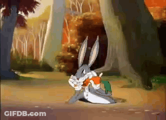 Bugs Bunny Is Eating A Carrot In A Cartoon Scene GIF