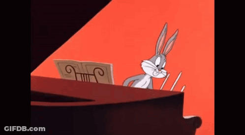 Bugs Bunny Is Playing A Piano With A Sheet Of Music GIF