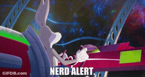 Bugs Bunny Is Sitting In A Car With The Words Nerd Alert Below Him GIF