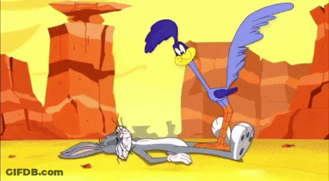 Bugs Bunny Lying Down Coyote Standing Over GIF