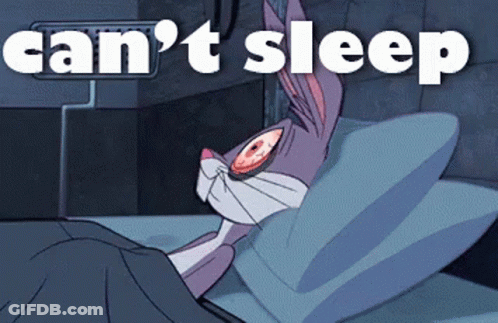 Bugs Bunny Lying In Bed Can't Sleep GIF