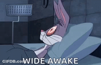 Bugs Bunny Lying In Bed Wide-Eyed GIF