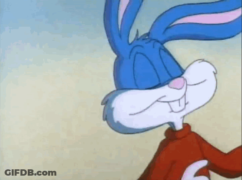 Bugs Bunny Smiling In Red Sweater On Beach GIF