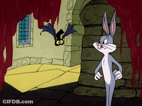 Bugs Bunny Standing Next To Flying Bat GIF