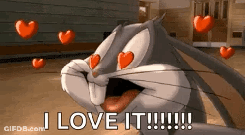 Bugs Bunny Surrounded By Hearts Saying I Love It GIF