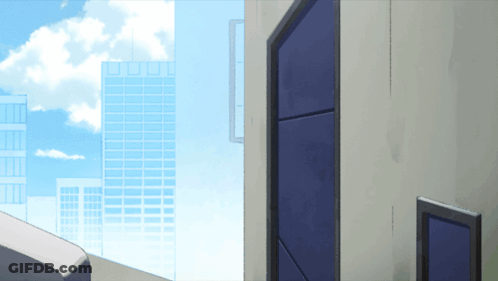 Building With Blue Door And Cloudy Sky GIF