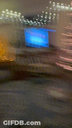 Building With Blue Sign GIF