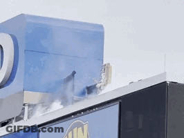 Building With Blue U.S. Mail Sign GIF