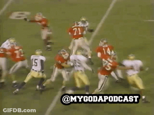 Bulldog On Leash Walking Football Field In Red Jersey GIF