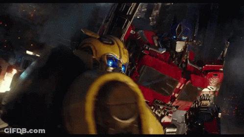Bumblebee And Optimus Prime Flying Through Air GIF