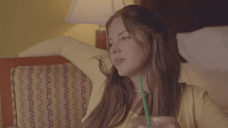Bummed Lana Del Rey Sitting On Couch GIF