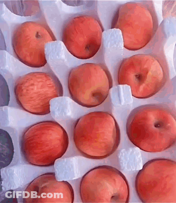 Bunch Of Apples In Styrofoam Tray GIF