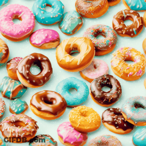 Bunch Of Donuts With Different Flavors And Sprinkles GIF