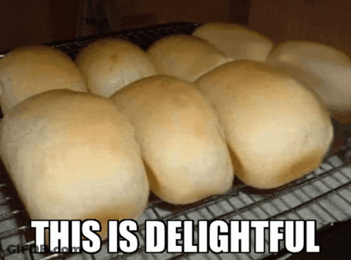 Bunch Of Rolls On Cooling Rack GIF