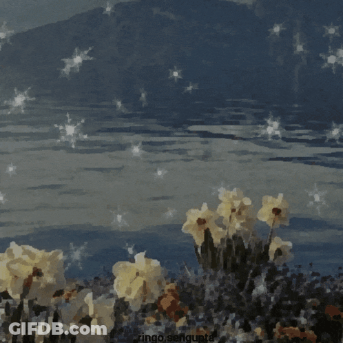Bunny With Pink Bow Sitting In Flowers GIF