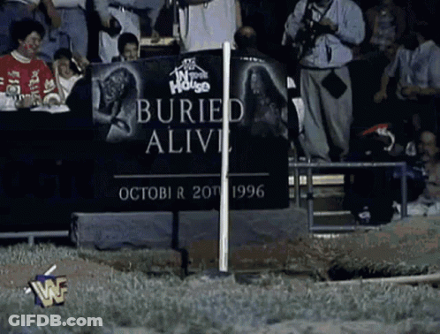 Buried Alive Sign In Crowd GIF
