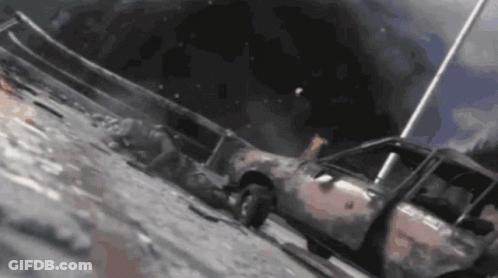 Burnt Out Car On Side Of Road GIF
