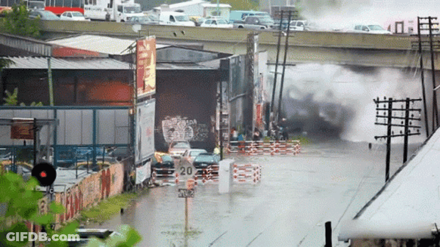 Bursting Water Flooded Streets GIF