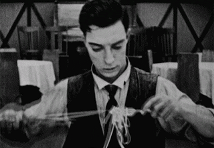 Buster Keaton Eating Pasta GIF