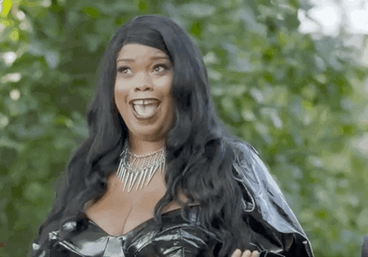 Busty Black Girl In Leather GIF