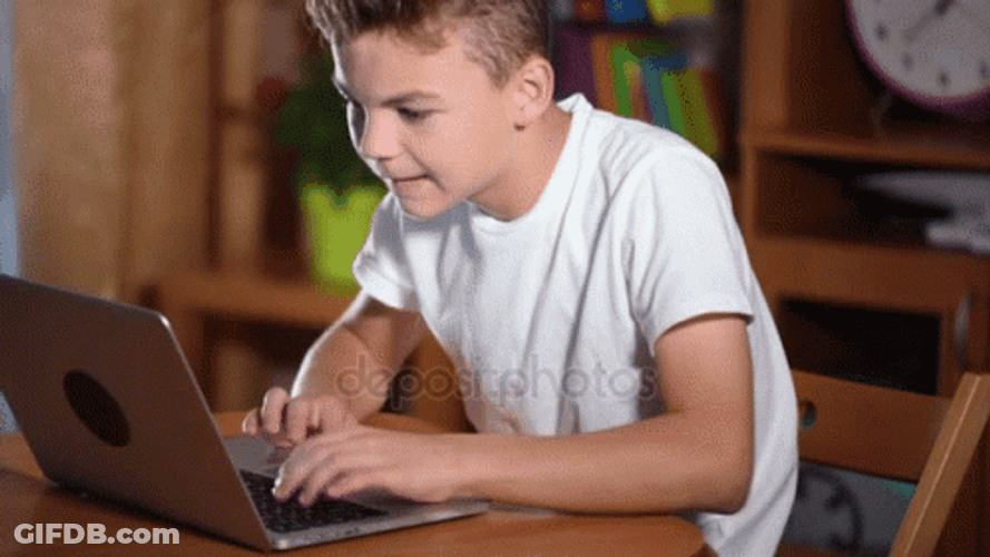 Busy Boy Using Laptop GIF