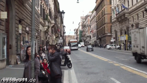 Busy City Street With Rescue911.de GIF