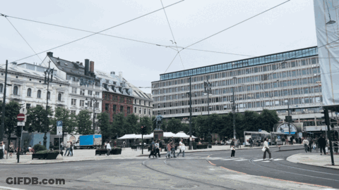 Busy Intersection With No Parking Sign GIF