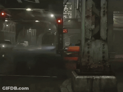 Busy Street At Night With A Few Dollars Sign GIF