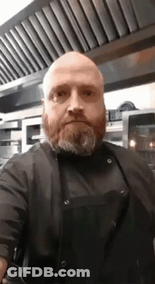 Butcher Shows His Knife GIF