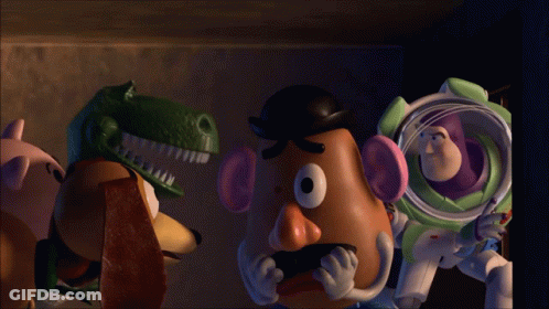 Buzz Lightyear And Mr Potato Head From Toy Story Are Standing Next To Each Other GIF