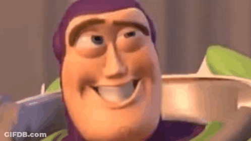 Buzz Lightyear From Toy Story Is Smiling And Looking At The Camera In A Close Up Of His Face . GIF