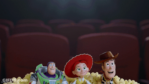 Buzz Lightyear Jessie And Woody From Toy Story Are Sitting In A Pile Of Popcorn GIF