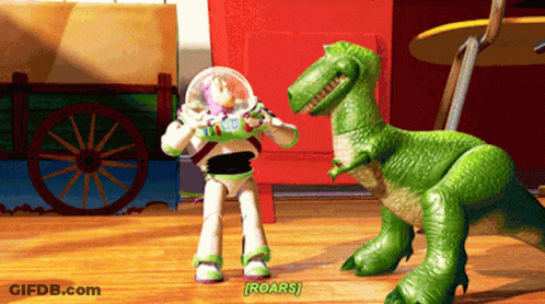 Buzz Lightyear Next To Green Toy Dinosaur Saying Roars GIF