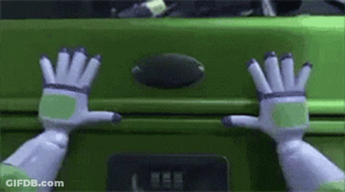 Buzz Lightyear Reaching Into Green Suitcase GIF