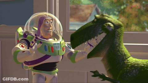 Buzz Lightyear Standing Next To Dinosaur GIF