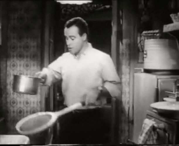 C.C. 'Bud' Baxter Transferring Pasta GIF