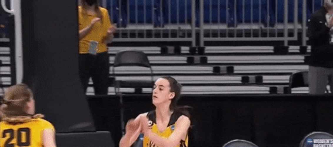 Caitlin Clark Jumping Shoulder Bump GIF