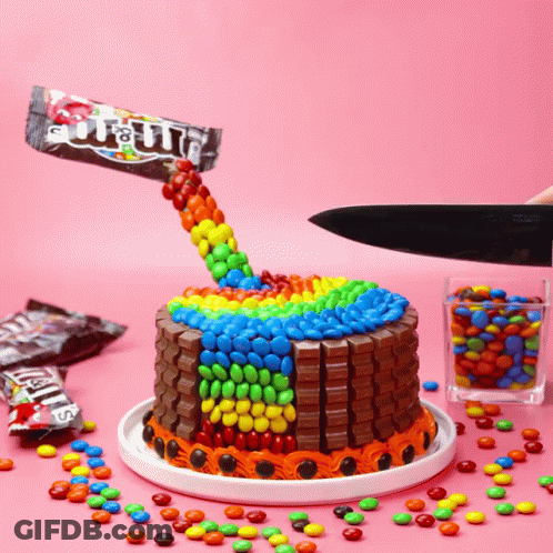 Cake With M&M's Candy Poured On Top GIF