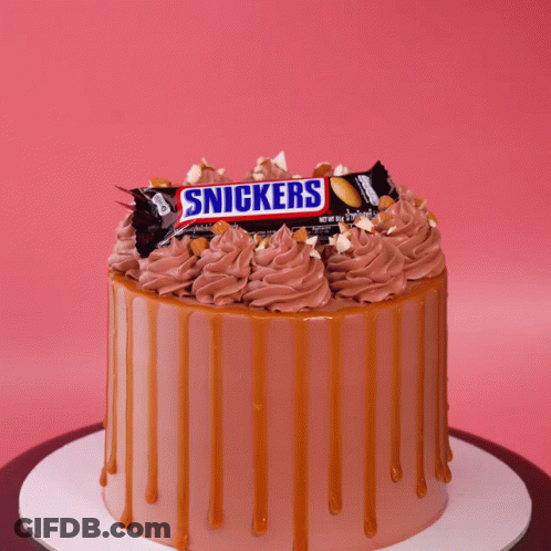 Cake With Snickers Bar GIF
