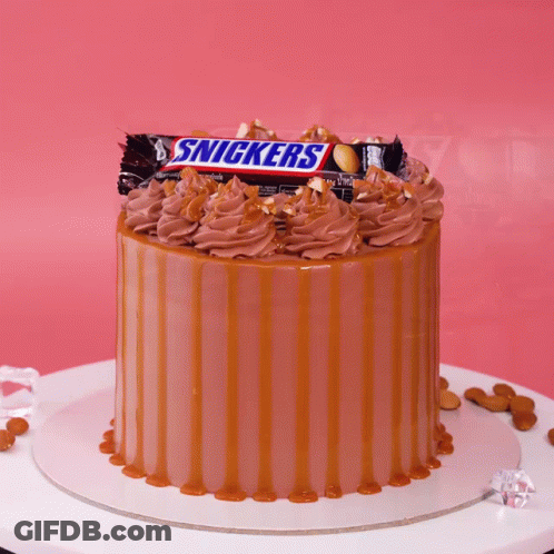 Cake With Snickers On Top GIF